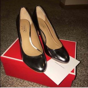 Coach silver heels.